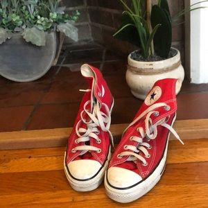 Red converse high tops